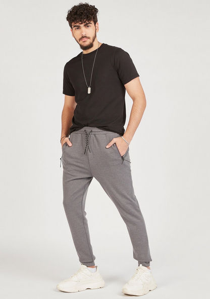 Solid Mid-Rise Joggers with Drawstring Closure and Zipped Pockets-Joggers-image-1