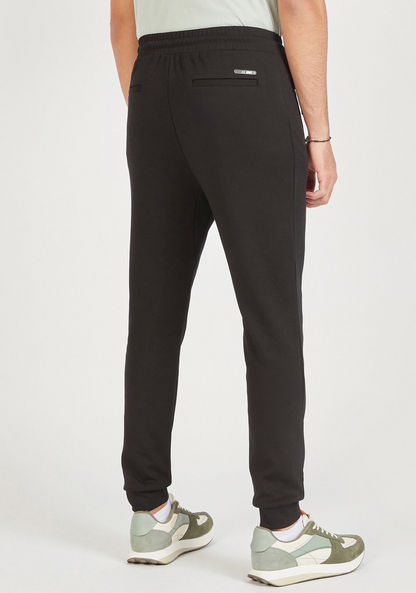 Solid Mid-Rise Joggers with Drawstring Closure and Zipped Pockets-Joggers-image-3