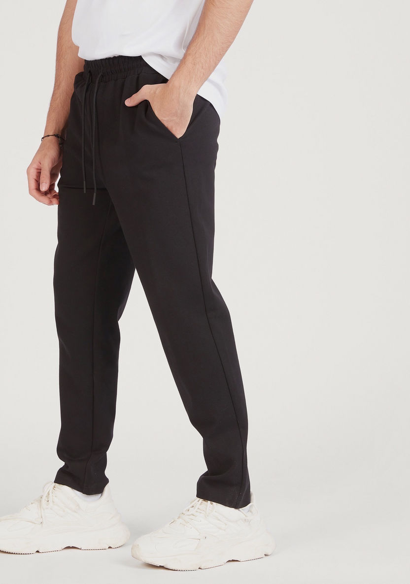 Solid Mid-Rise Track Pants with Drawstring Closure and Pockets-Pants-image-0