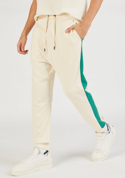 Solid Full Length Joggers with Pockets and Side Panels-Joggers-image-1