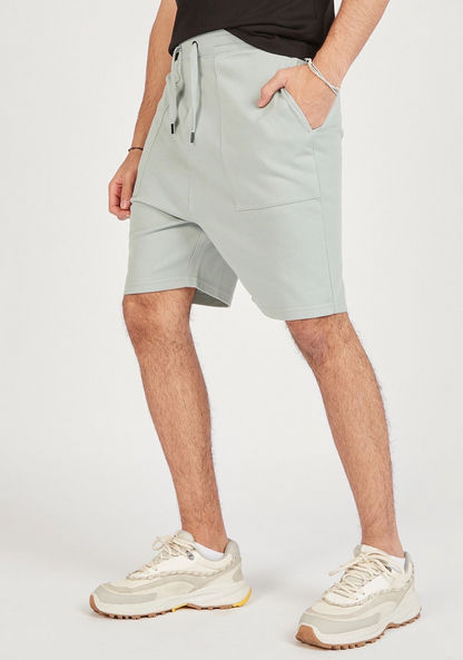 Solid Shorts with Pockets and Drawstring Closure-Shorts-image-1