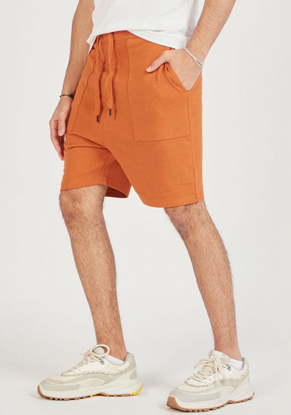 Solid Shorts with Pockets and Drawstring Closure-Shorts-image-0