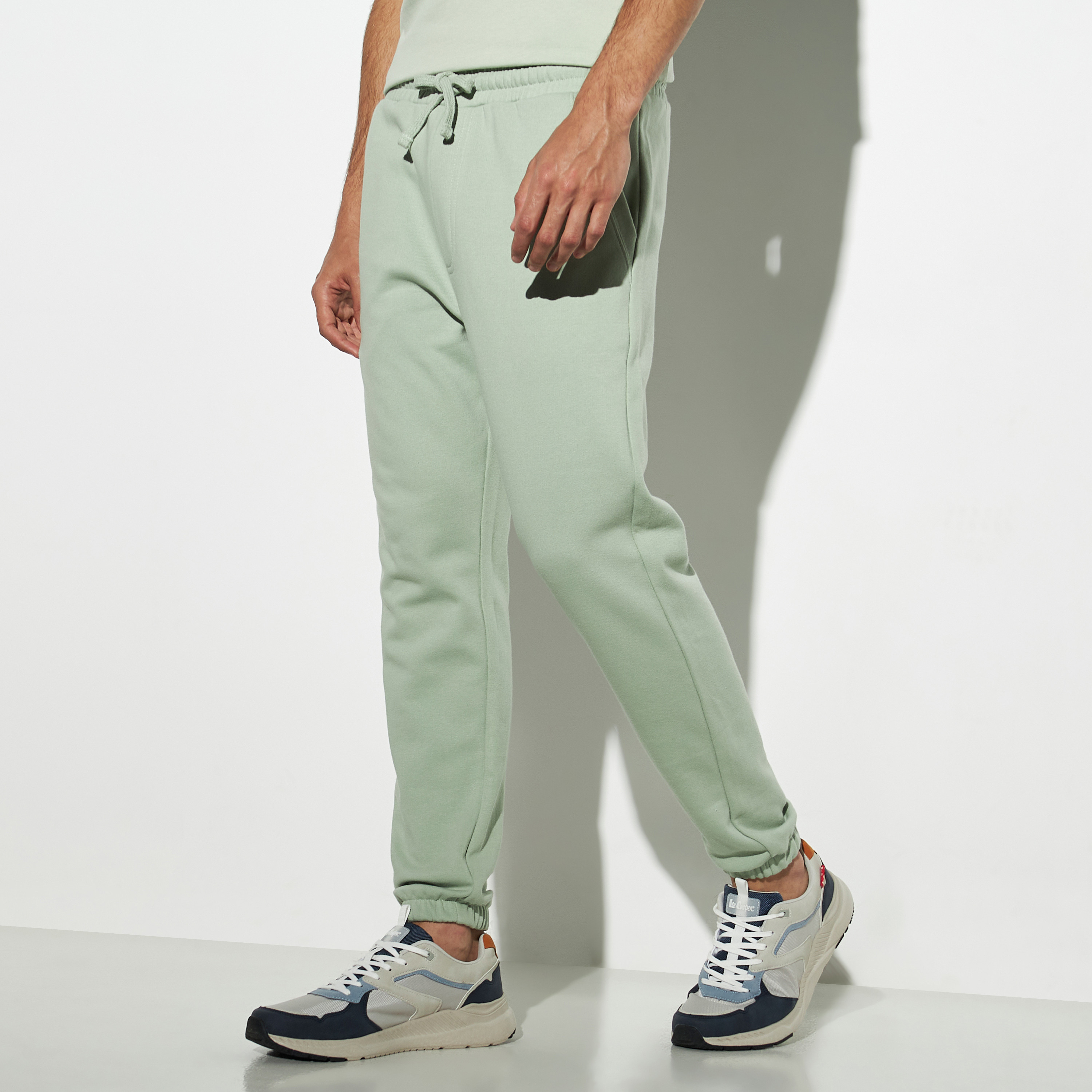 Buy Men s Solid Joggers with Drawstring Closure Online