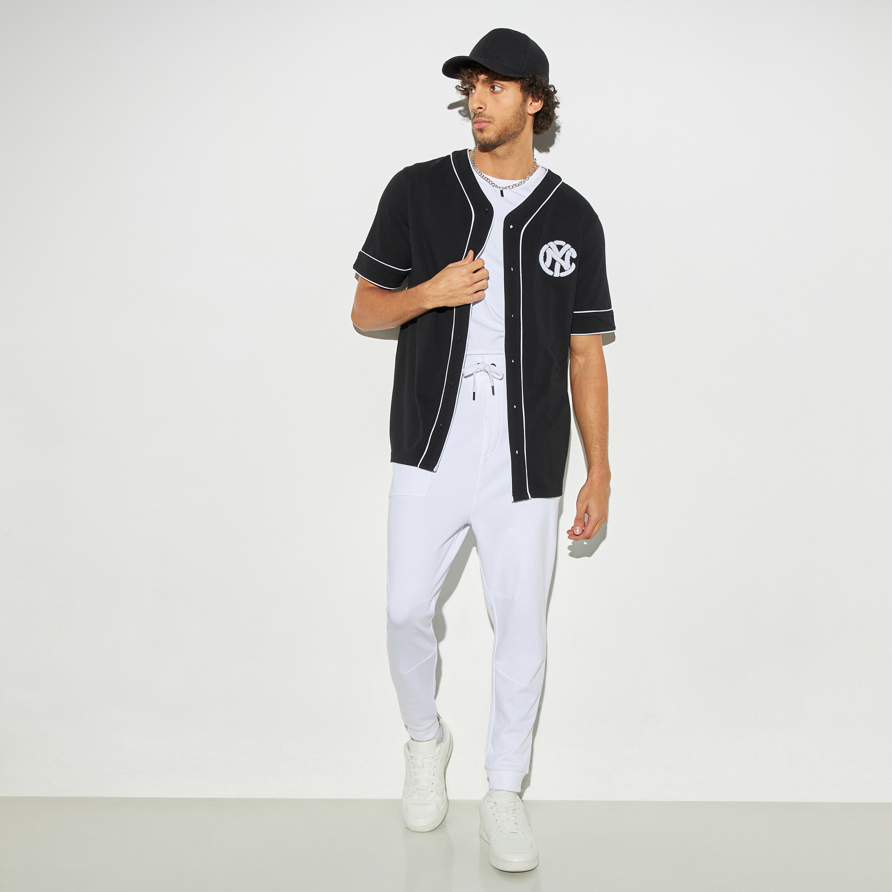 Buy Men s Embroidered Baseball Shirt with V neck and Short Sleeves Online Centrepoint UAE