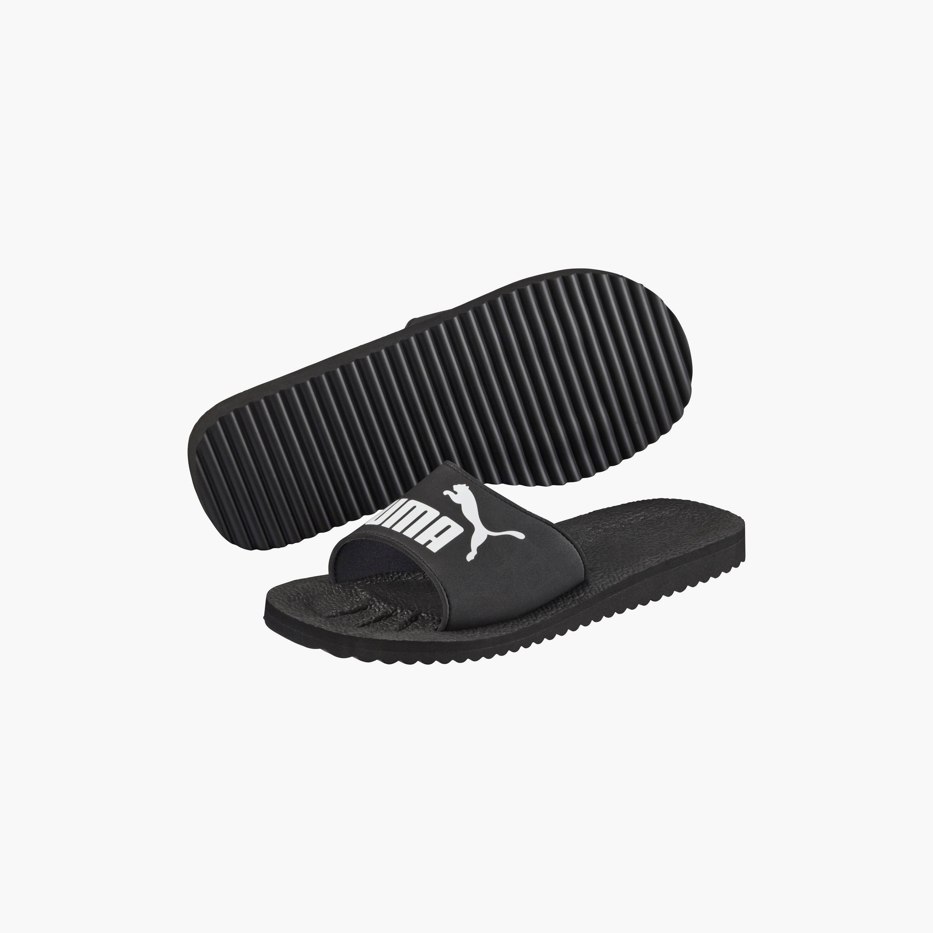 سلايدز بوما بيوركات للجنسين | 360262-men-shoes-flipflopsandslides-image-2