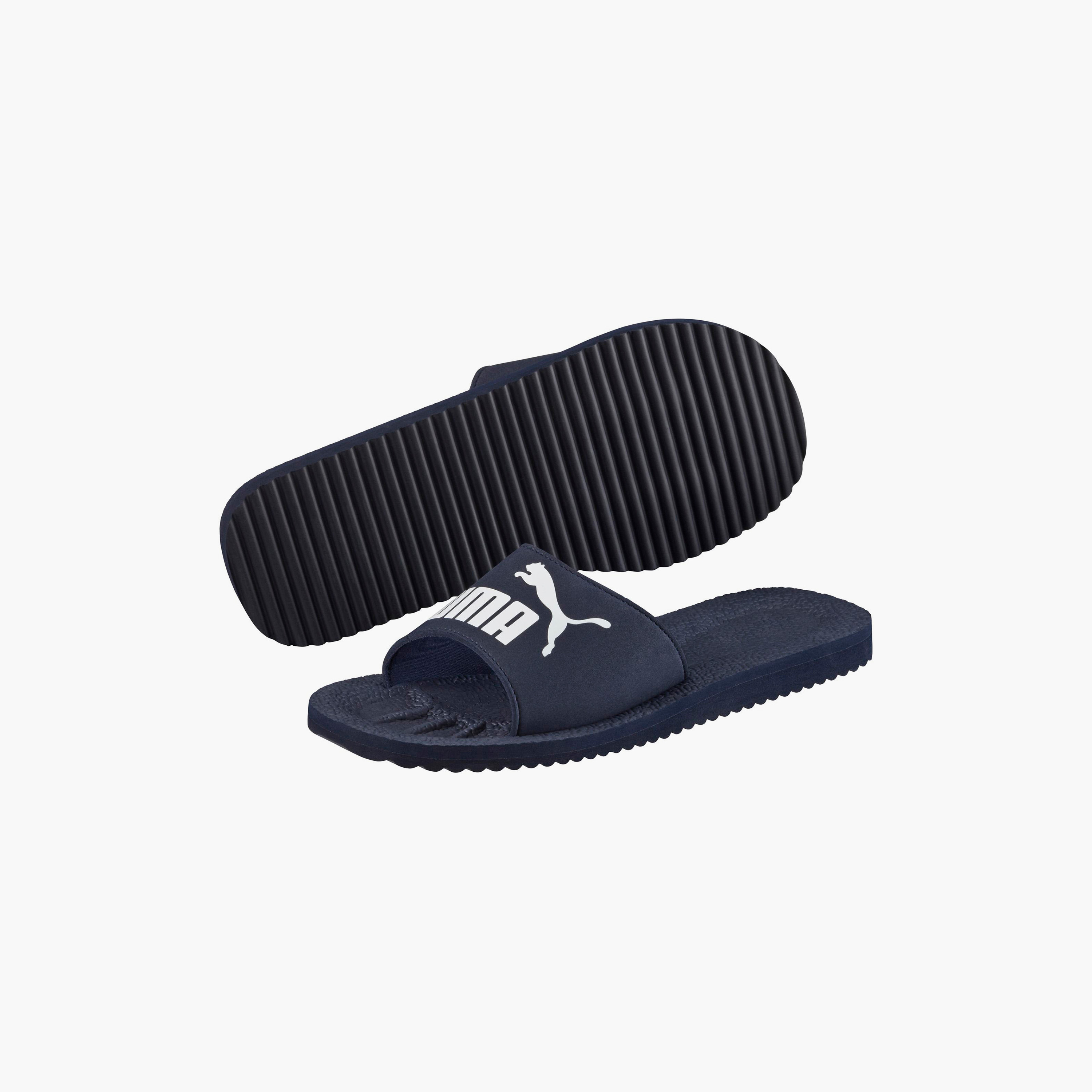 سلايدز بوما بيوركات للجنسين | 360262-men-shoes-flipflopsandslides-image-7