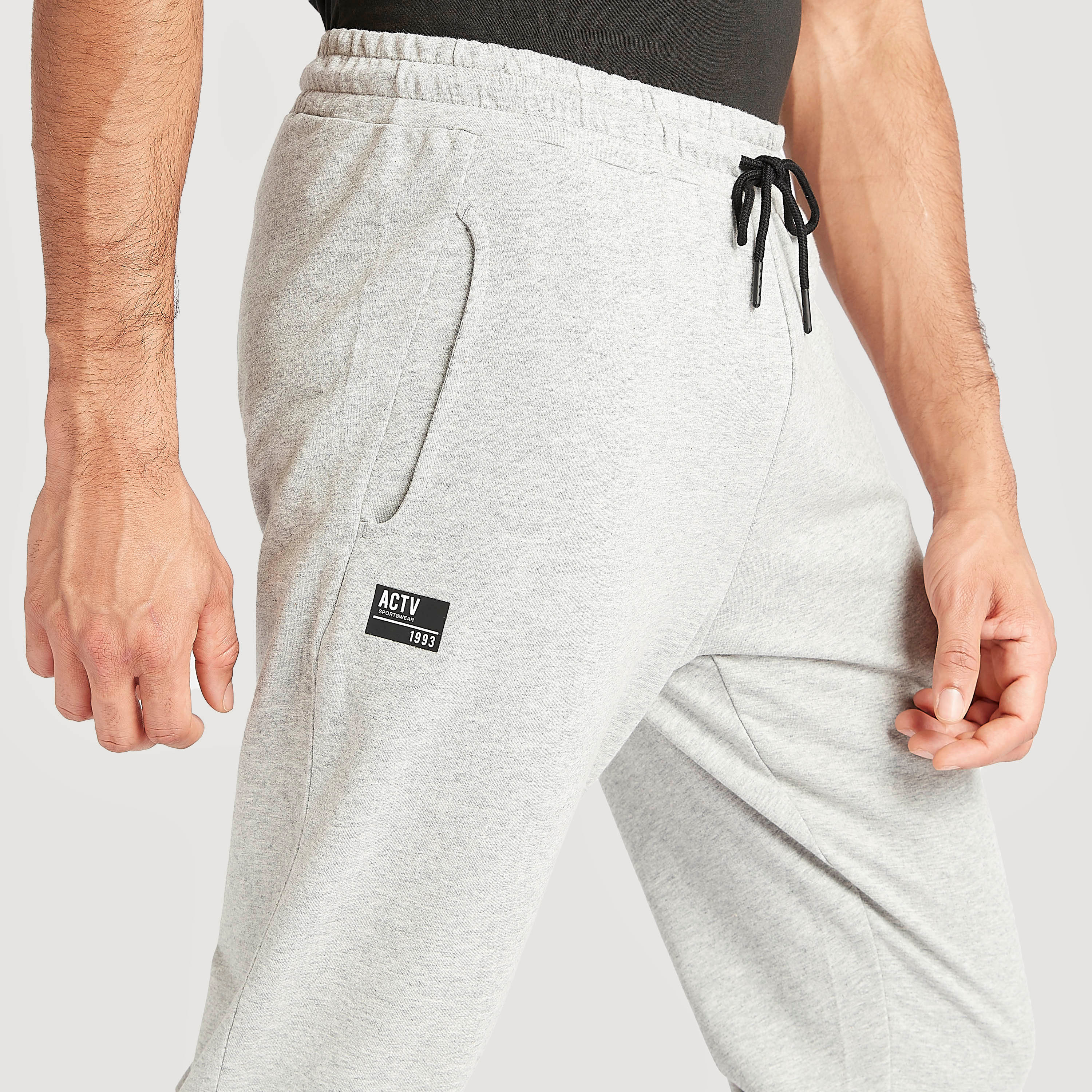 بنطلون رياضي سادة برباط خصر مطّاطي وجيوب-sports-men-clothing-bottoms-image-3