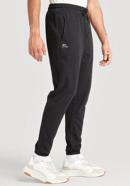 Solid Jog Pants with Elasticated Waistband and Pockets