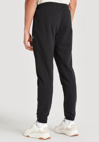 Solid Jog Pants with Elasticated Waistband and Pockets