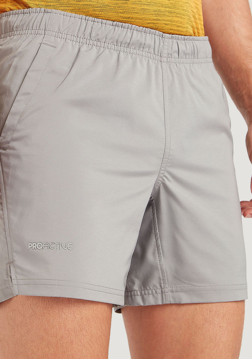 Solid Shorts with Elasticated Waist and Pockets-Bottoms-image-0