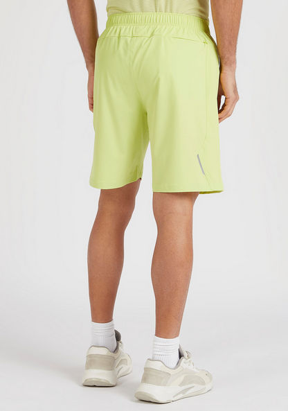 Solid Panelled Shorts with Zipper Pockets and Elasticated Waist