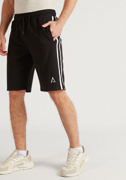 Solid Knee Length Shorts with Pockets and Drawstring Closure