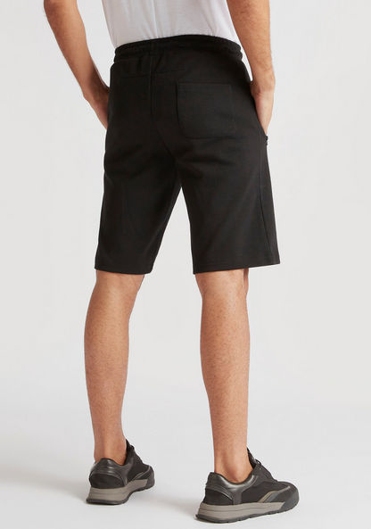 Solid Shorts with Zip Pockets and Drawstring Closure