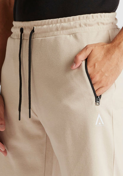 Solid Shorts with Zip Pockets and Drawstring Closure