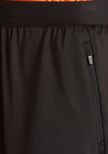 Solid Shorts with Elasticised Waistband and Zipped Pockets