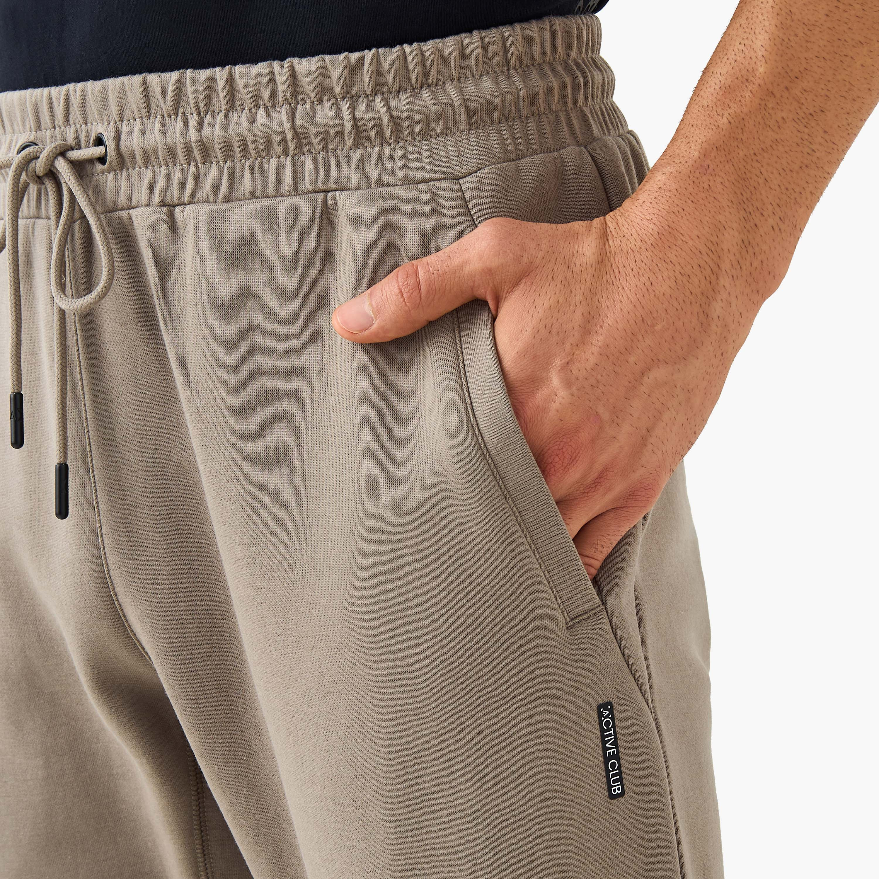 Regular Fit Panelled Joggers with Pockets-men-clothing-sportswearandactivewear-tracksuits-image-4