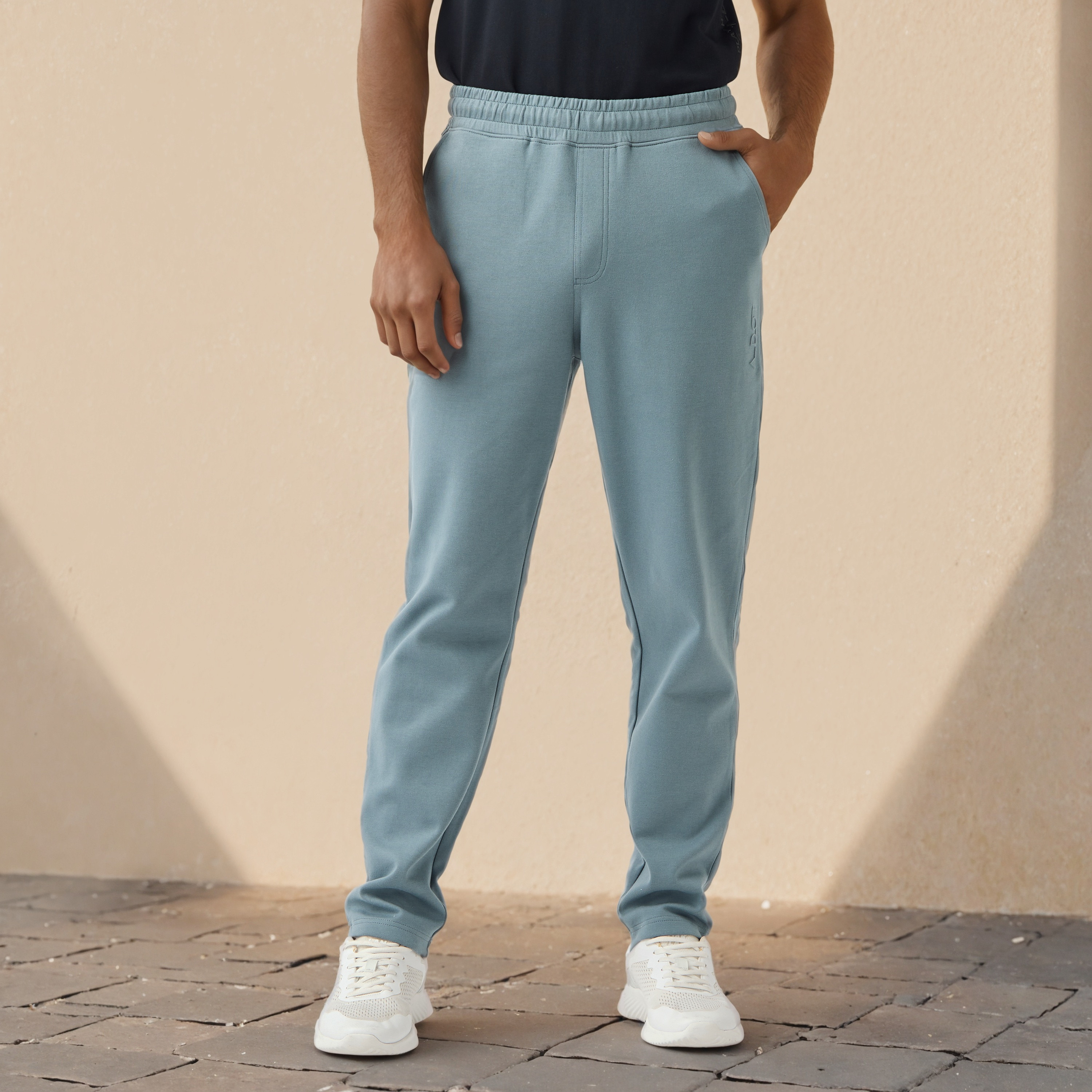 Embossed Logo Track Pants with Pockets-men-clothing-sportswearandactivewear-bottoms-joggers-image-1