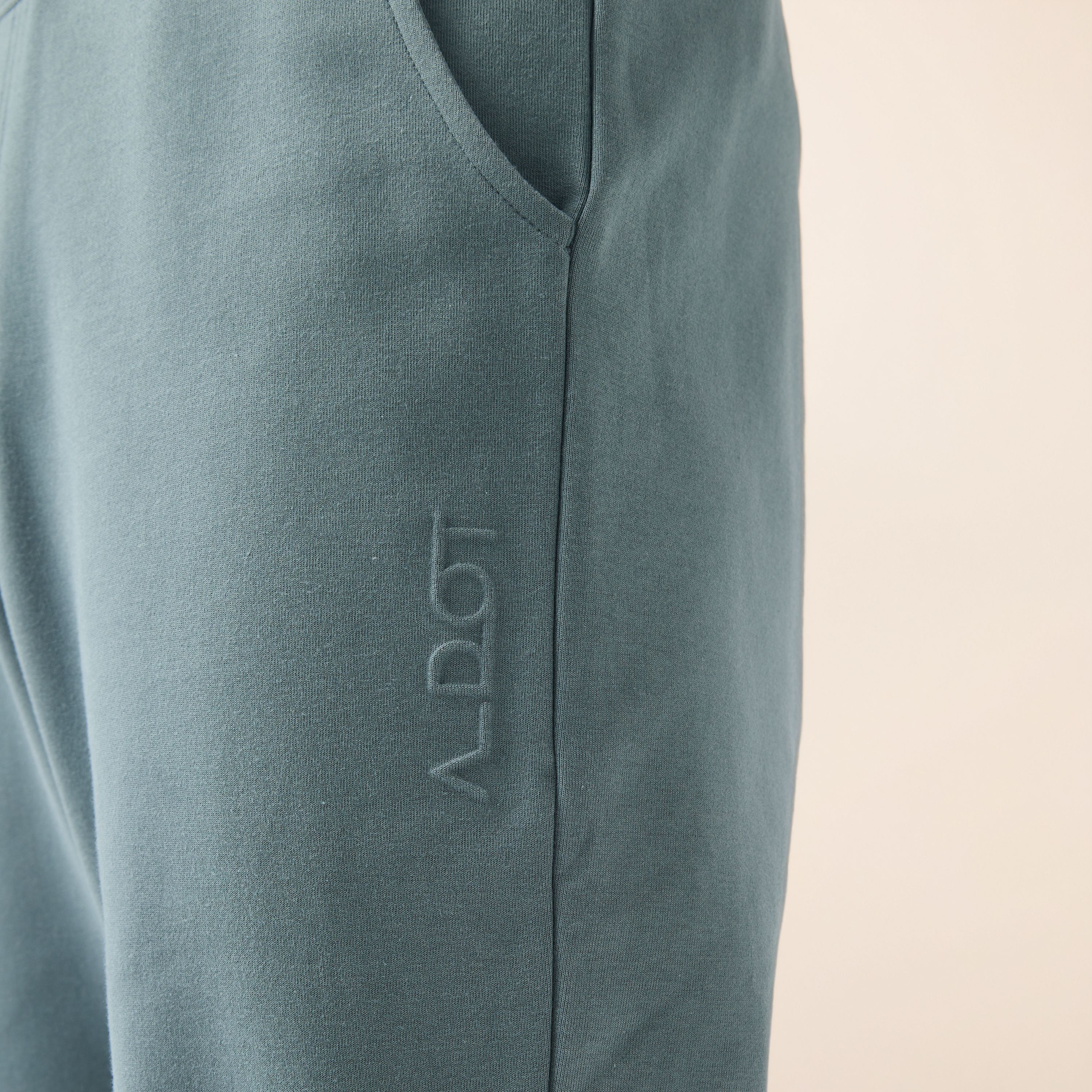 Embossed Logo Track Pants with Pockets-men-clothing-sportswearandactivewear-bottoms-joggers-image-4