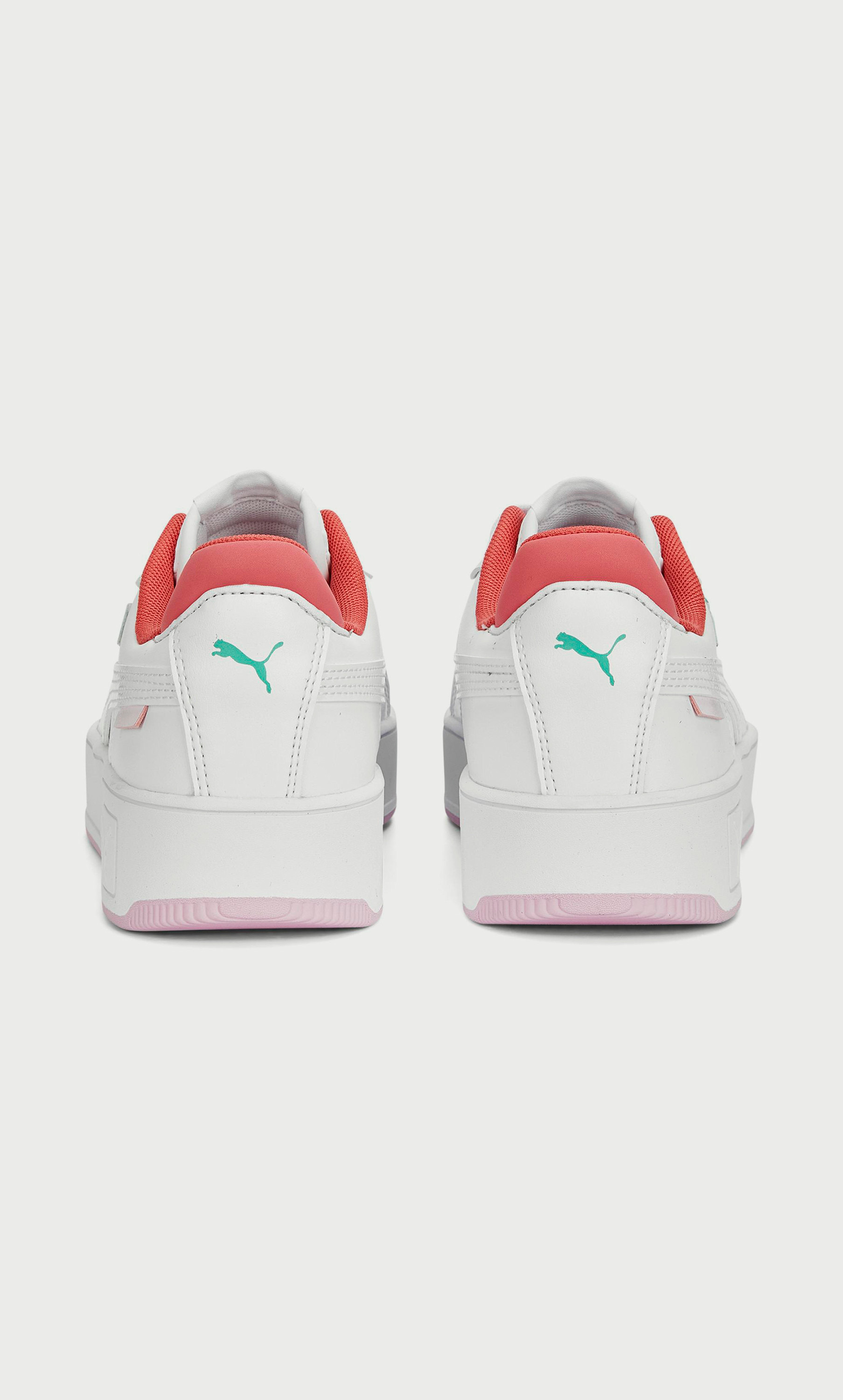 Puma carina outlet sneakers wit/roze