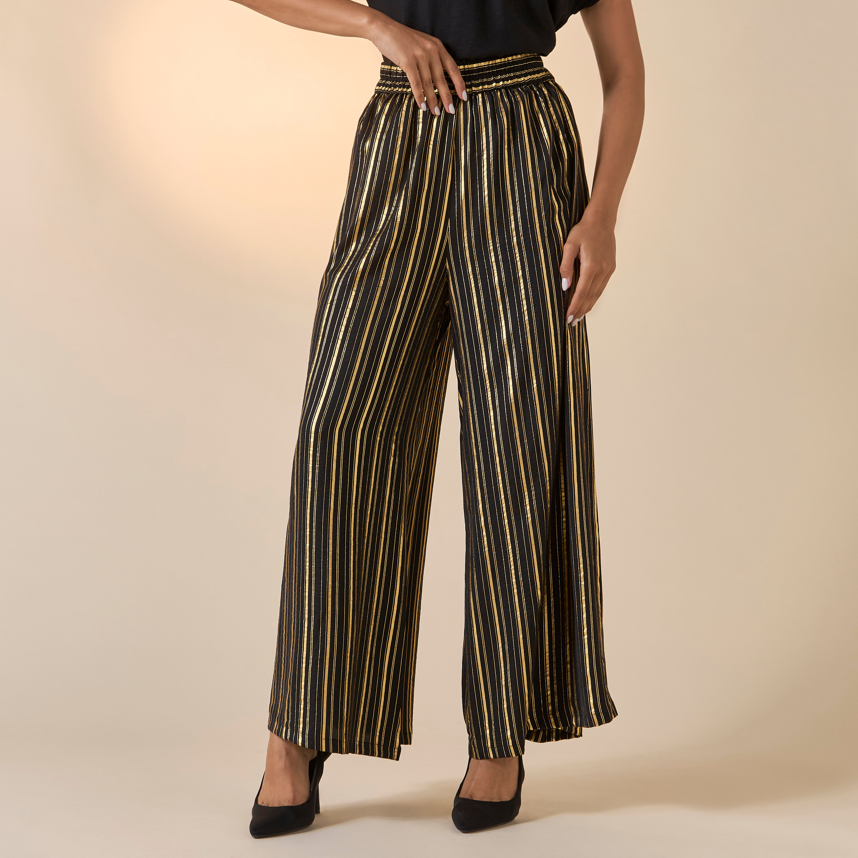 بنطلون مخطّط واسع الساقين بخصر مطاطي من جولدن آبل-women-clothing-bottoms-trousers-image-1