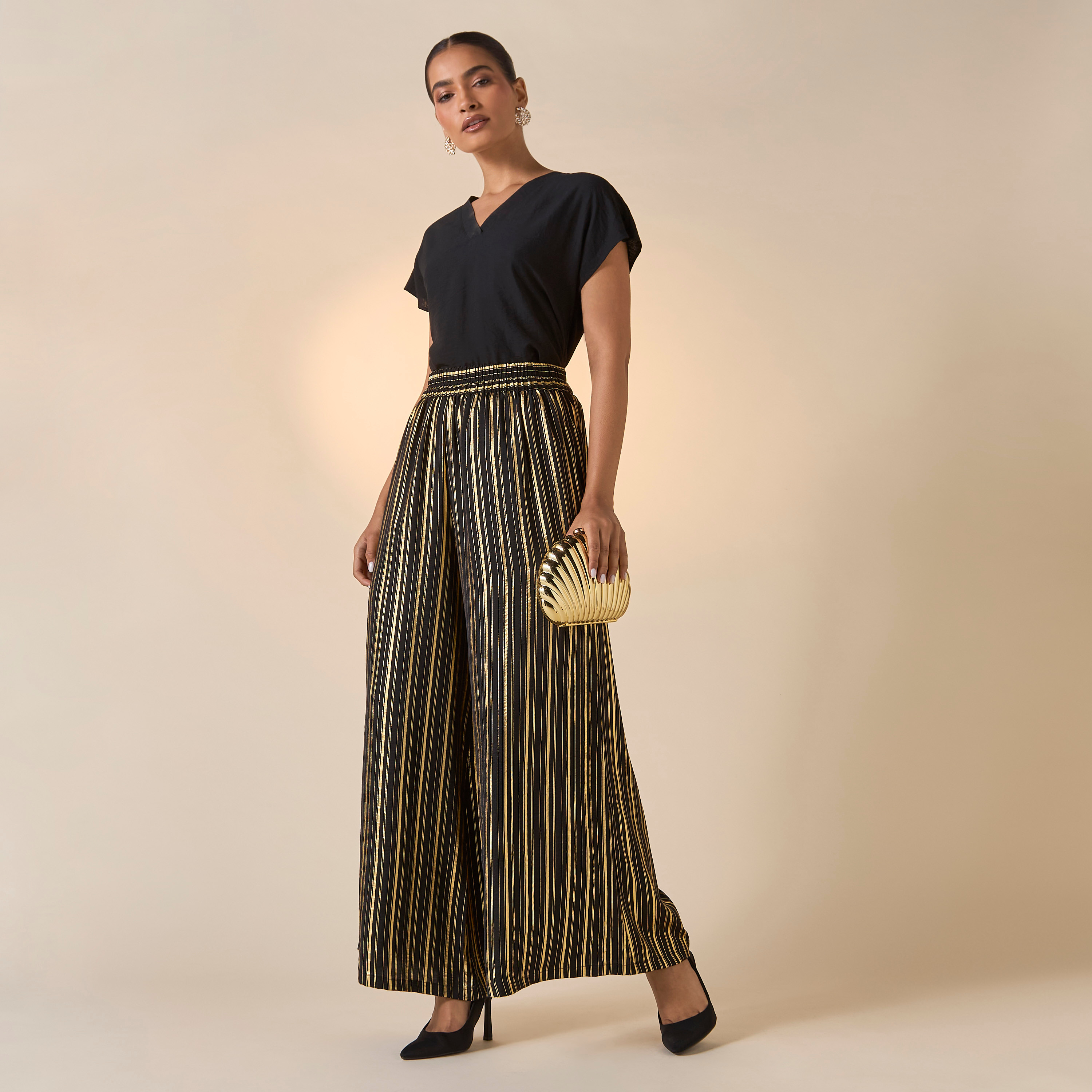 بنطلون مخطّط واسع الساقين بخصر مطاطي من جولدن آبل-women-clothing-bottoms-trousers-image-2
