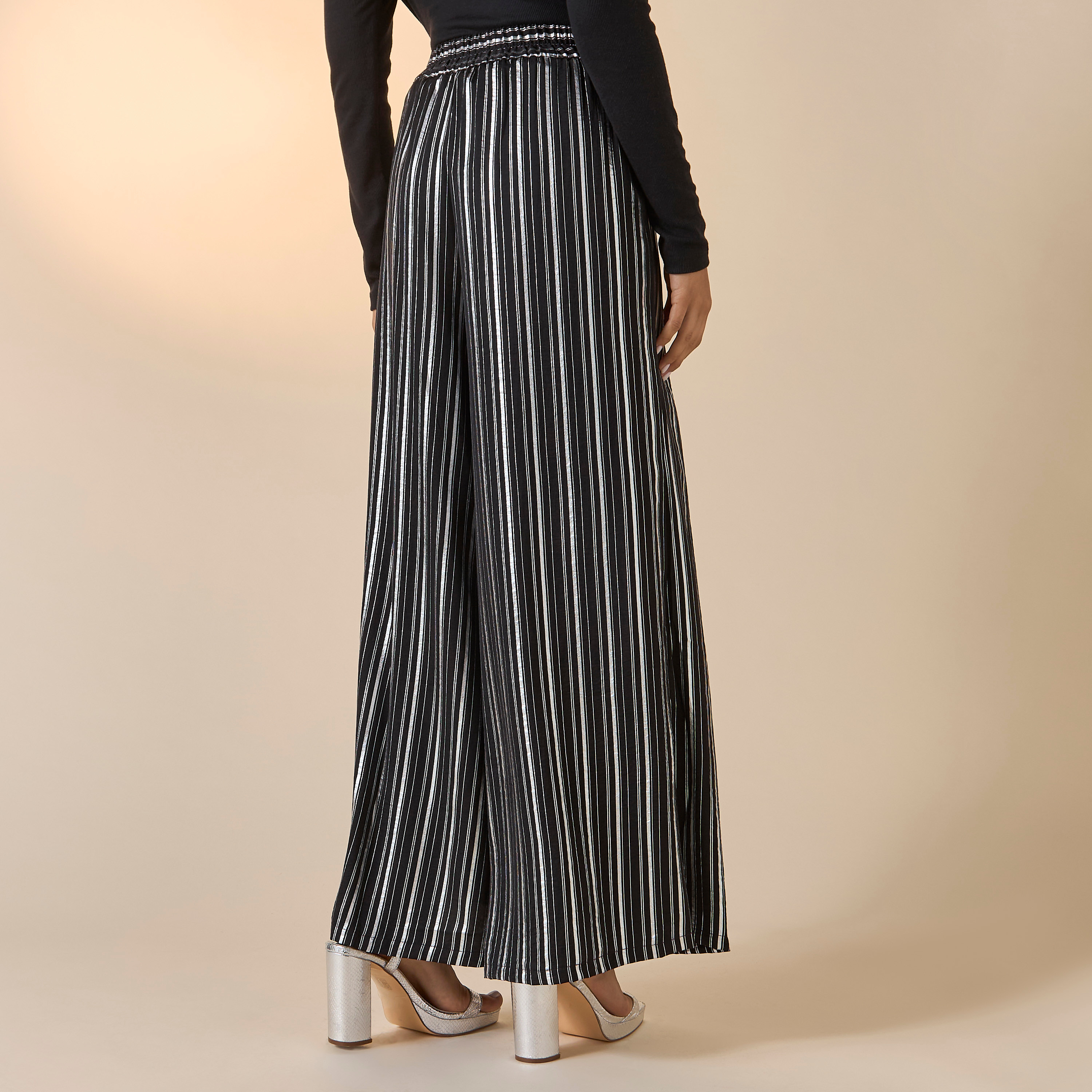 بنطلون مخطّط واسع الساقين بخصر مطاطي من جولدن آبل-women-clothing-bottoms-trousers-image-7