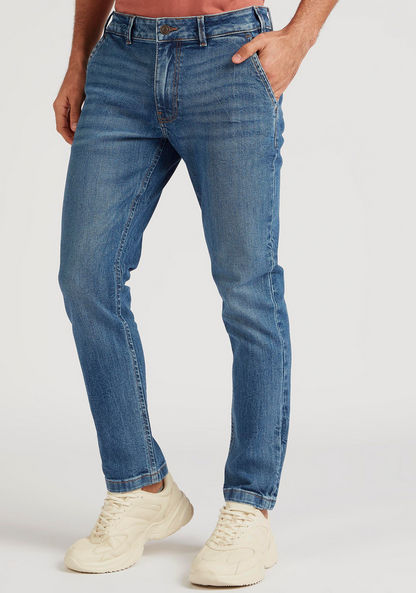 Solid Carrot Fit Mid-Rise Jeans with Pockets