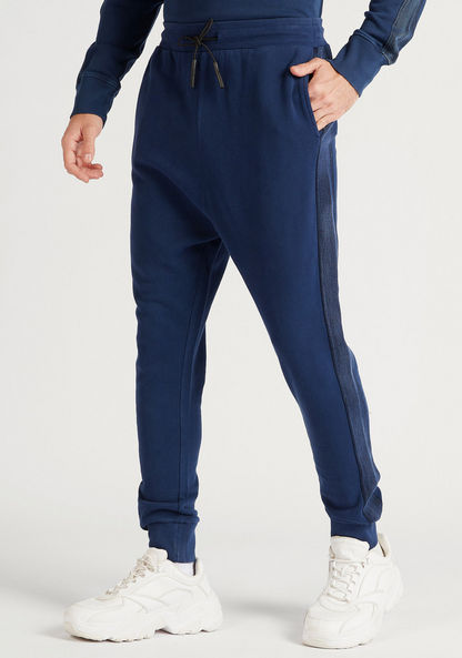 Solid Denim Joggers with Drawstring Closure and Pockets