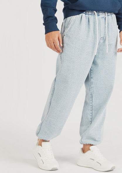 Low-Rise Denim Joggers with Drawstring Closure and Pockets