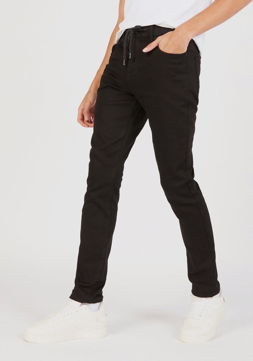 Solid Slim Fit Jeans with Zip Closure and Pockets-Jeans-image-0