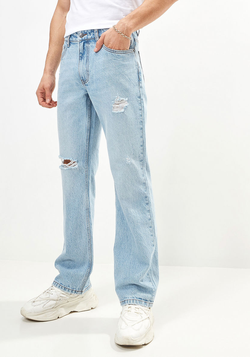 Buy Men's Ripped Denim Jeans with Button Closure and Pockets Online ...