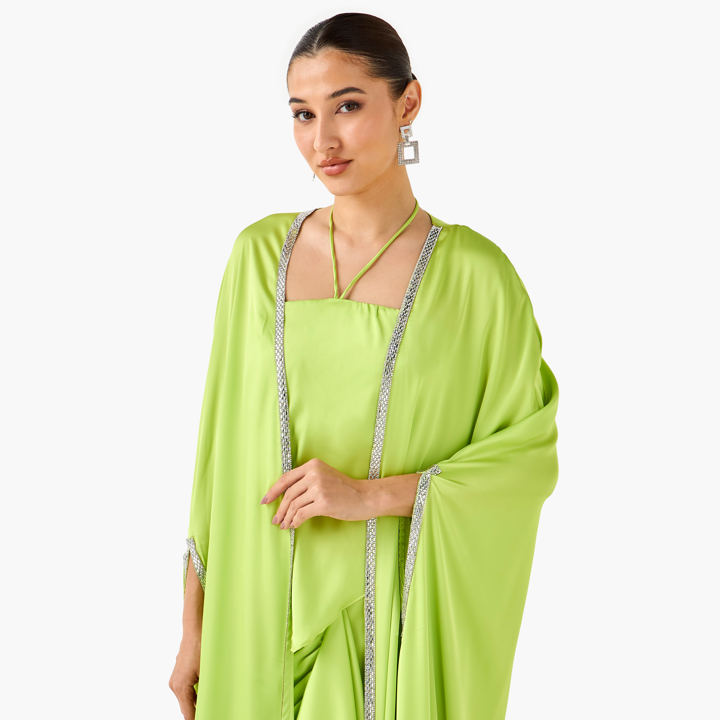 بلوزة هالتر مع تنورة كشكش وسترة شروج كيب من غولدن آبل-women-clothing-dresses-image-13