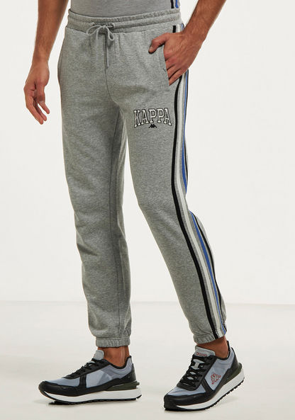 Buy Men's Kappa Tape Joggers with Drawstring Closure and Pockets Online | Centrepoint UAE
