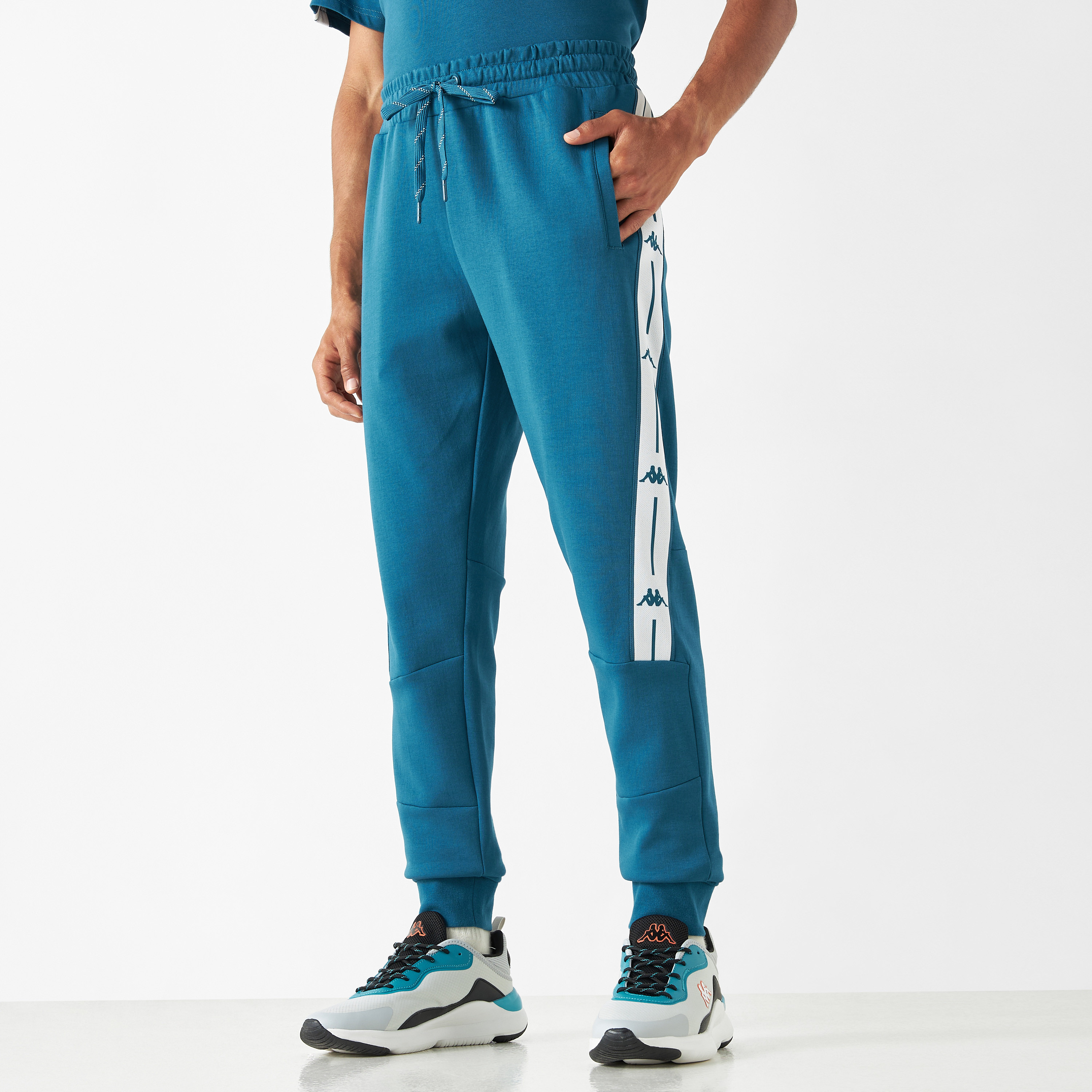 Buy Kappa Tape Detail Joggers with Drawstring Closure and Pockets Splash UAE