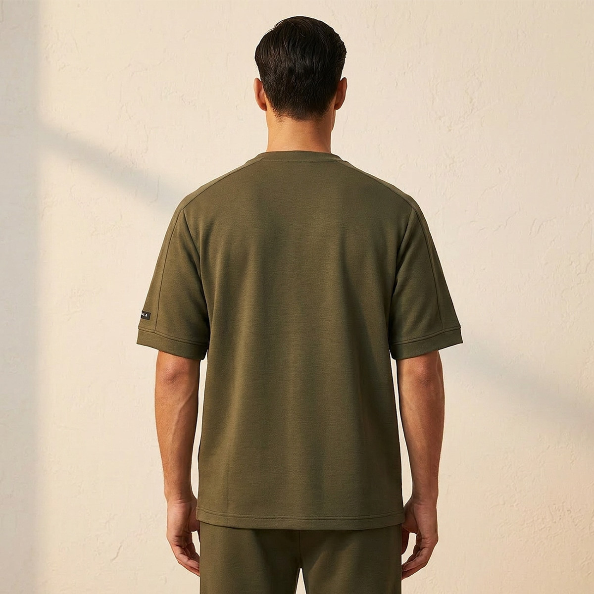 تيشيرت بلون موحد قابل للتمدد في اتجاهين من لاف بانجولين-men-clothing-sportswearandactivewear-tshirtsandpolos-image-4