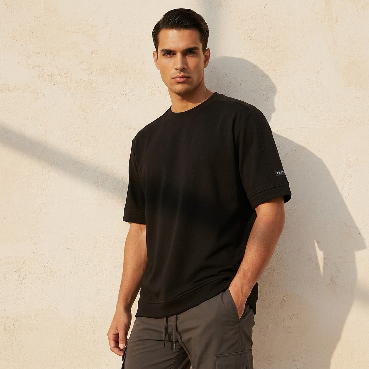 تيشيرت بلون موحد قابل للتمدد في اتجاهين من لاف بانجولين-men-clothing-sportswearandactivewear-tshirtsandpolos-image-1