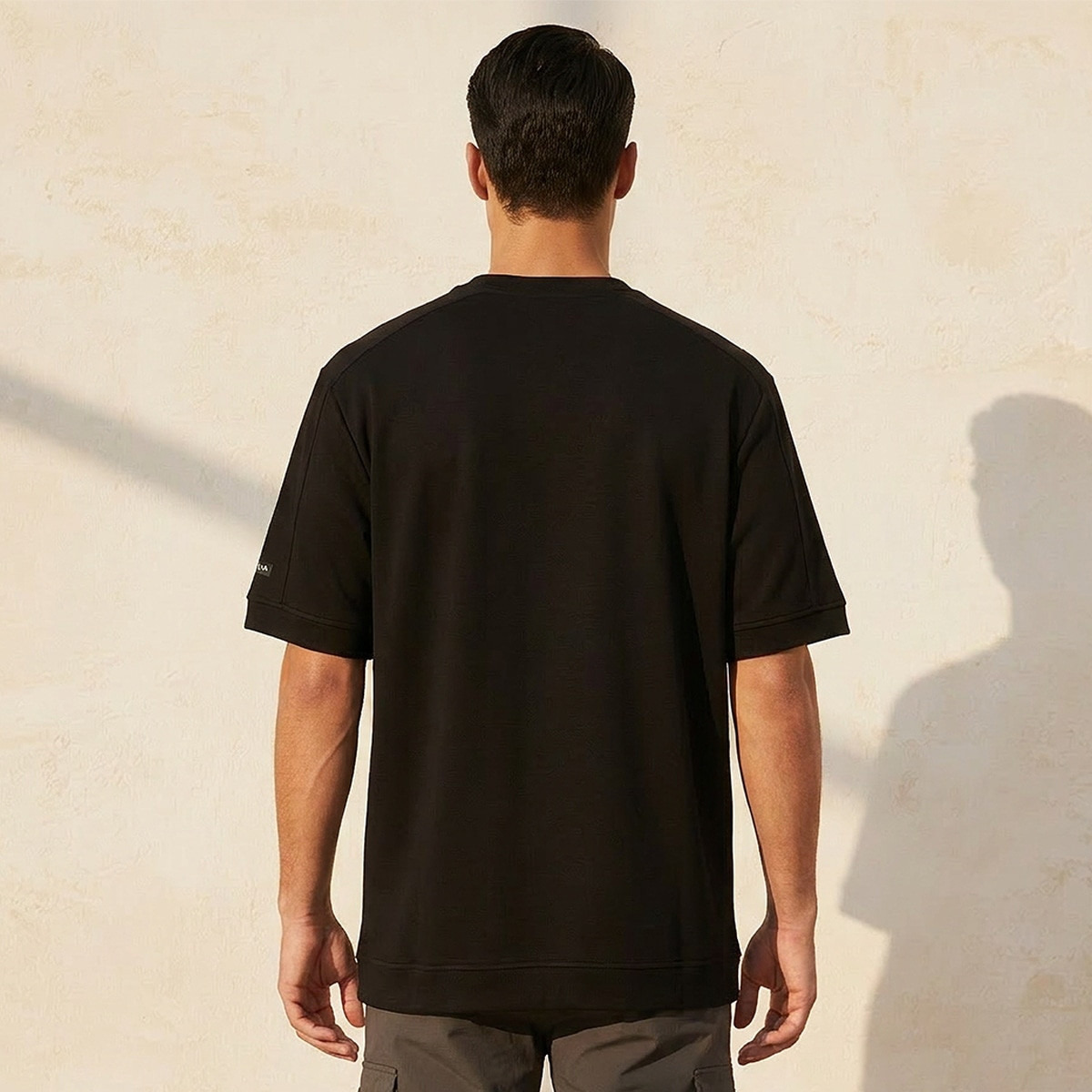 تيشيرت بلون موحد قابل للتمدد في اتجاهين من لاف بانجولين-men-clothing-sportswearandactivewear-tshirtsandpolos-image-4