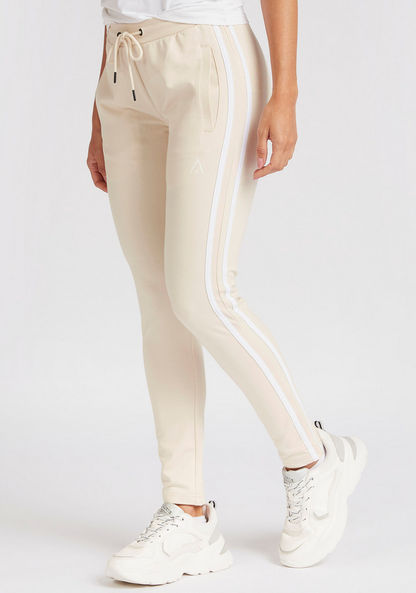 Solid Track Pants with Drawstring Closure and Tape Detail-Joggers-image-0