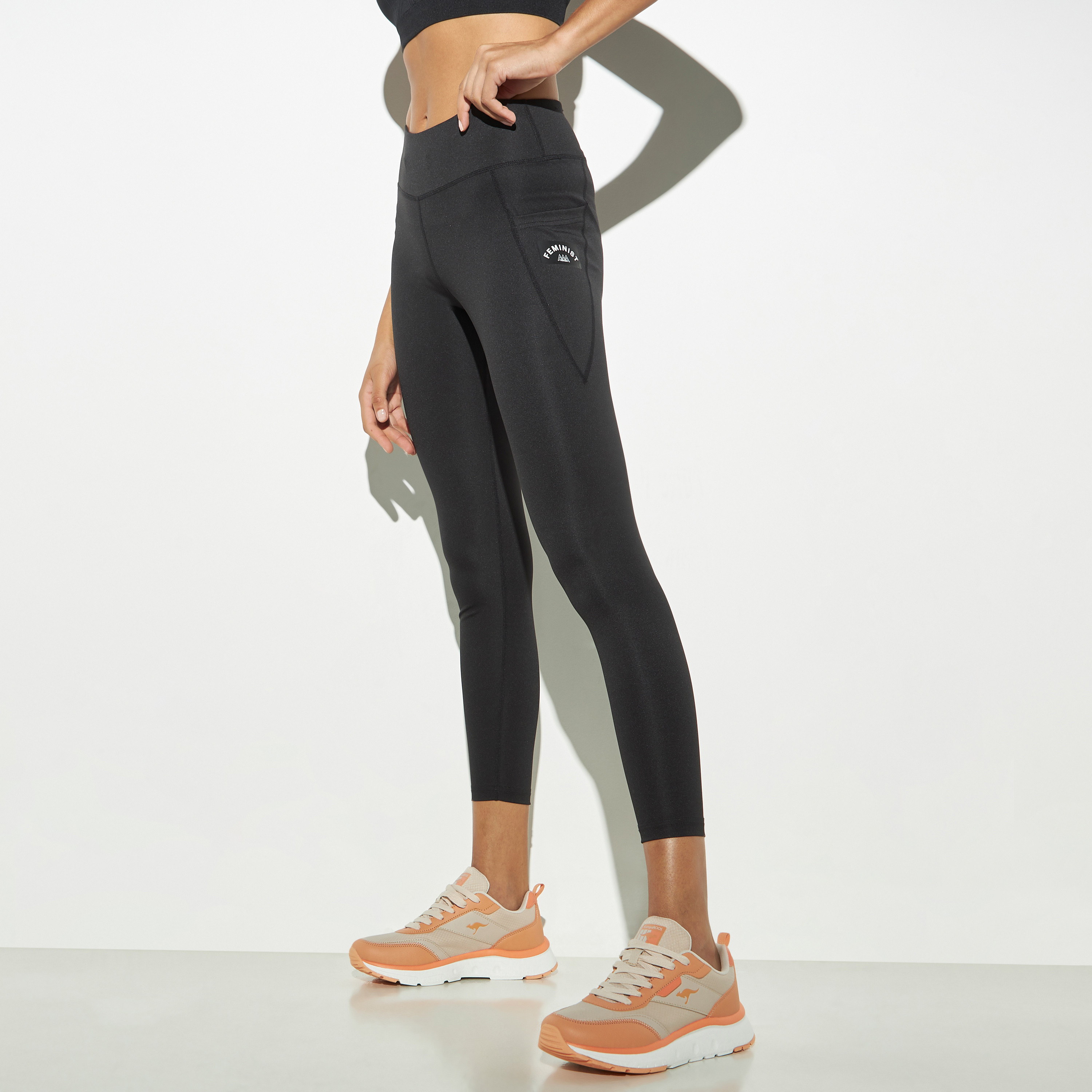 بنطلون ليقينز سادة بخصر مطاطي وجيب-women-clothing-bottoms-leggings-image-1