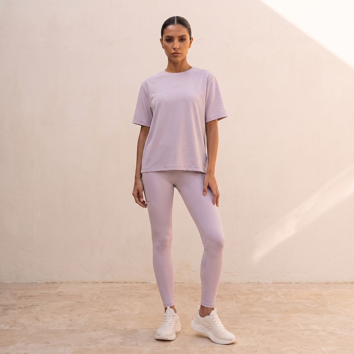 بنطلون ليقنز مطاطي بألواح مثقبة-women-clothing-sportswearandactivewear-bottoms-leggings-image-2
