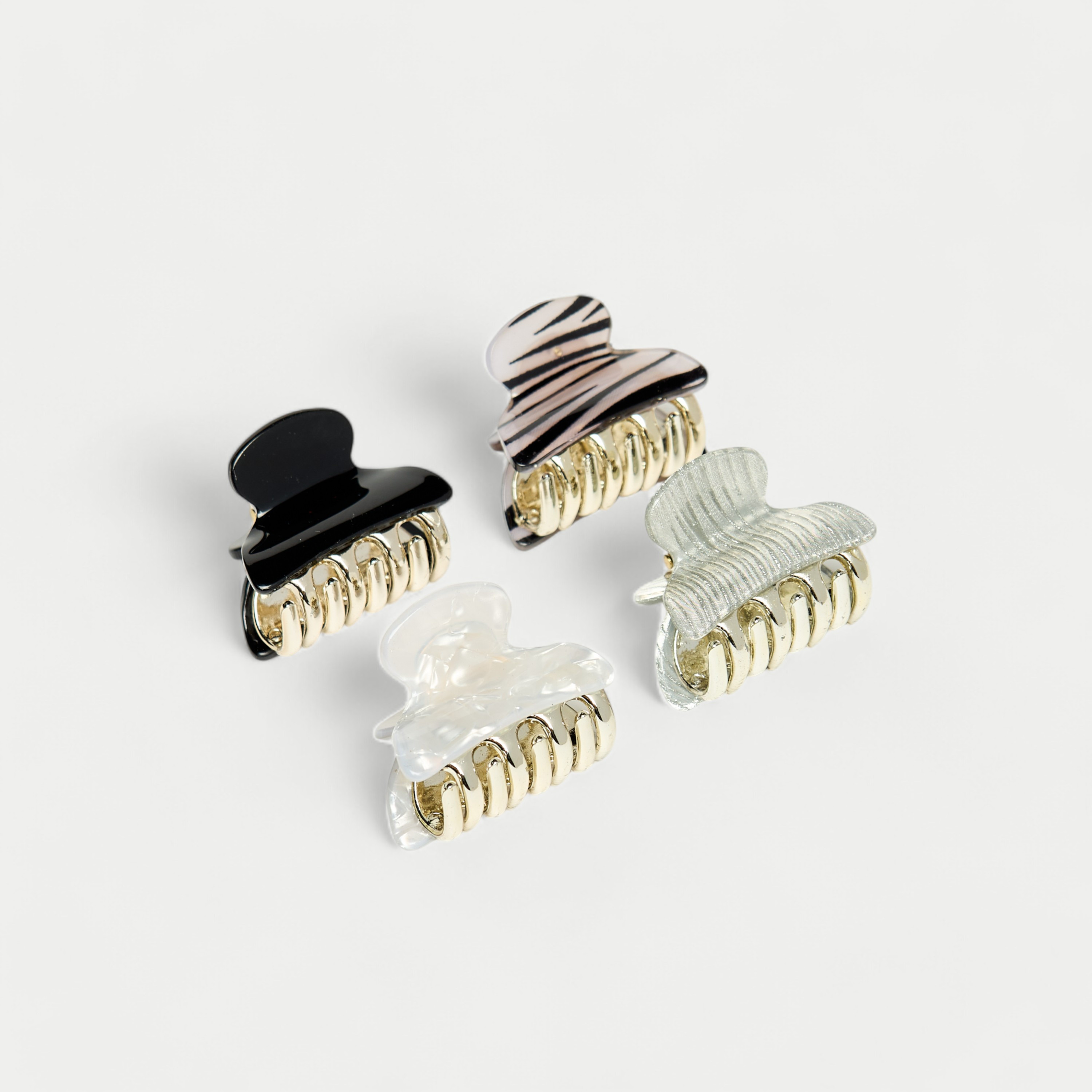طقم مشابك شعر 4 قطع متنوعة-women-hairaccessories-image-1