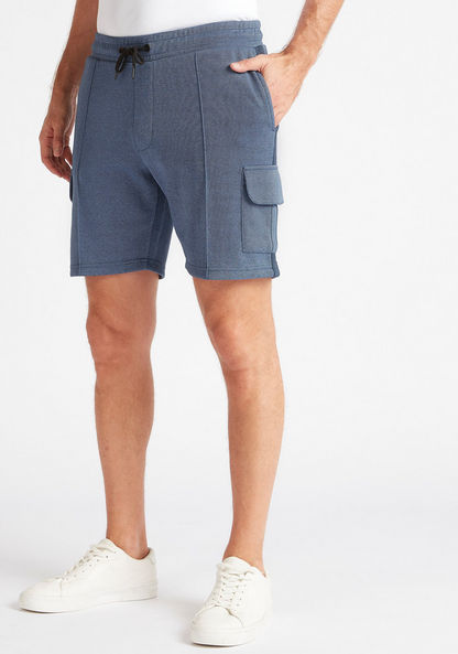 Textured Mid-Rise Shorts with Flap Pockets
