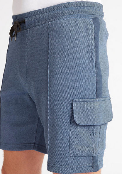 Textured Mid-Rise Shorts with Flap Pockets