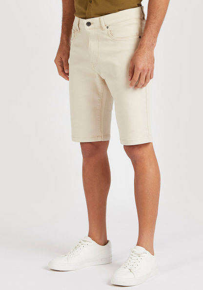 Solid Knee Length Shorts with Button Closure