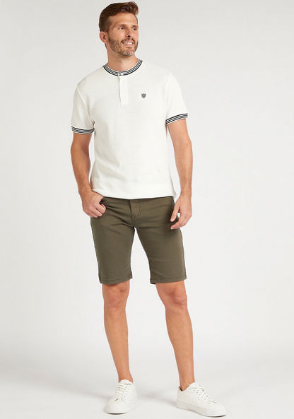 Solid Knee Length Shorts with Button Closure