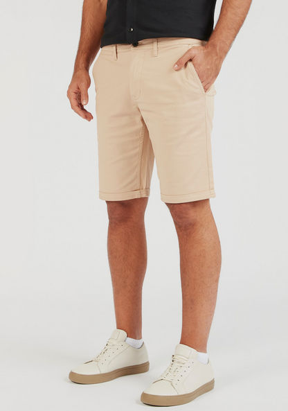 Solid Shorts with Pockets and Button Closure-Shorts-image-0