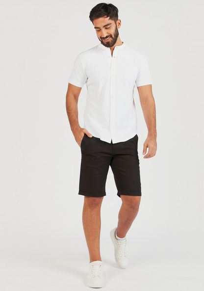 Solid Shorts with Pockets and Button Closure-Shorts-image-1