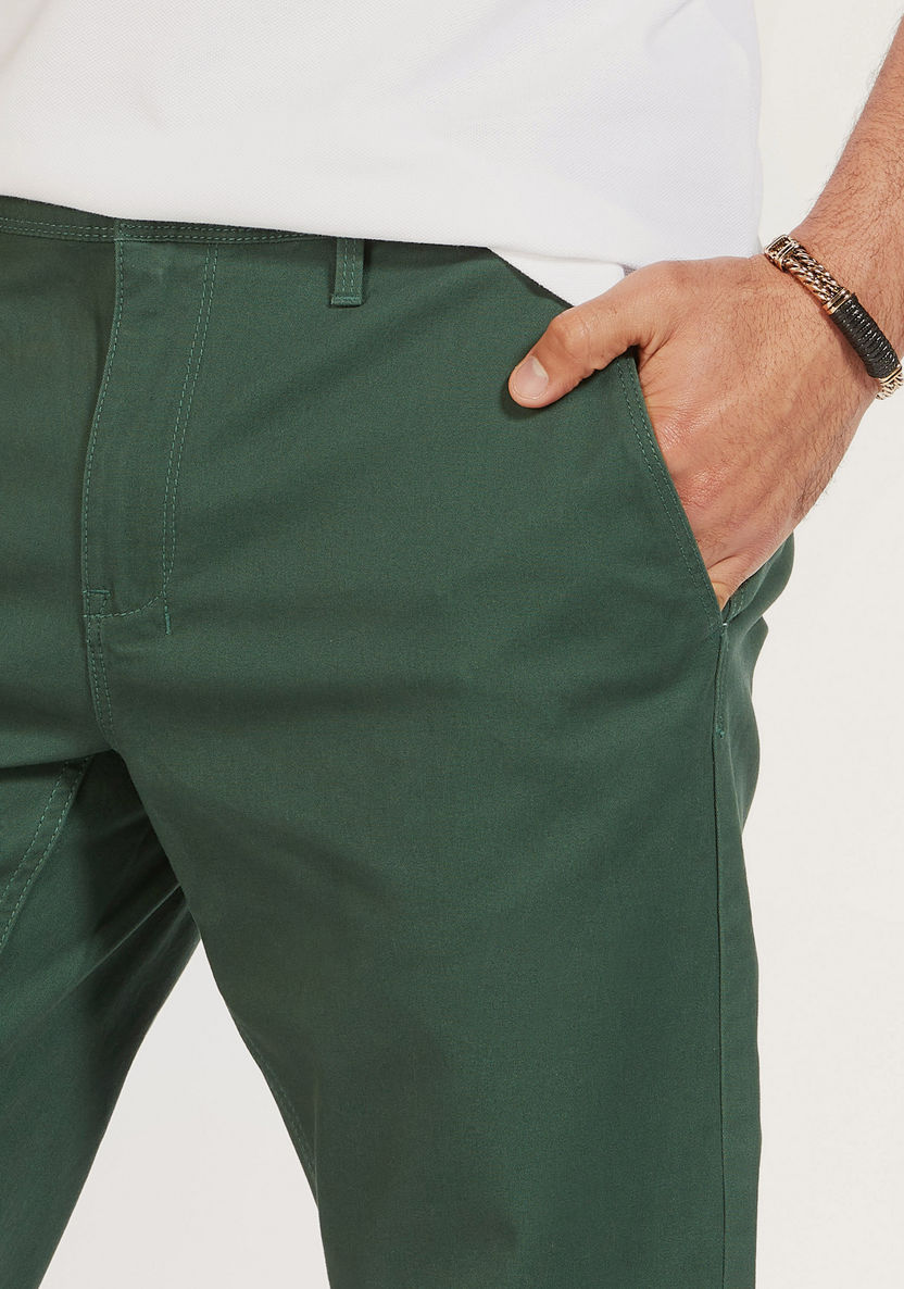 Solid Mid-Rise Chinos with Pockets and Button Closure-Pants-image-2