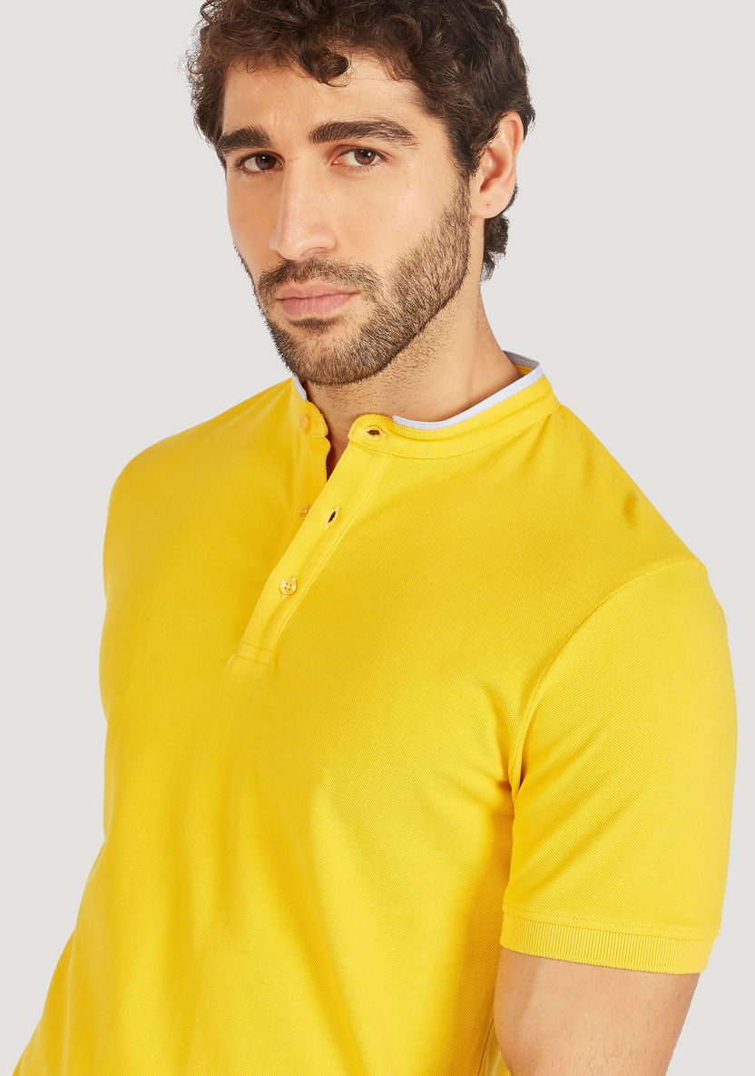 Solid Mandarin Neck Polo T-shirt with Short Sleeves and Button Closure-Polos-image-0