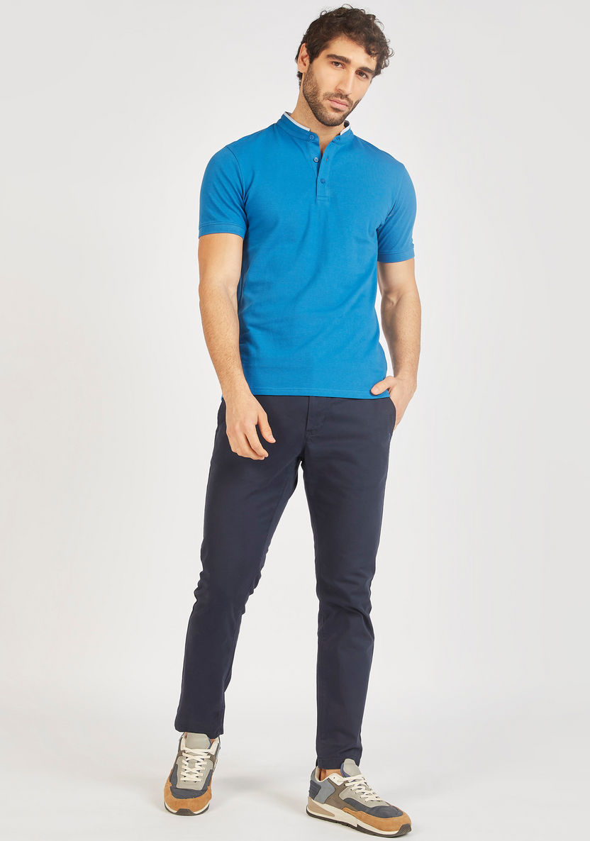 Solid Mandarin Neck Polo T-shirt with Short Sleeves and Button Closure-Polos-image-1